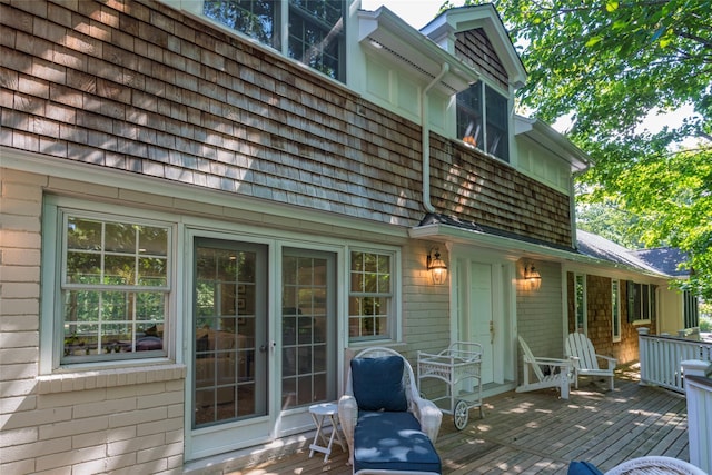 rear view of property with a deck