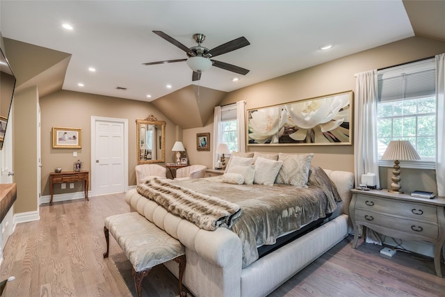 bedroom with recessed lighting, visible vents, vaulted ceiling, light wood-type flooring, and baseboards