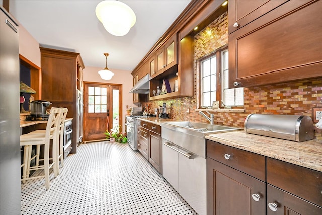 33-64 190th St, Flushing, NY 11358 - kitchen with stainless steel appliances, ventilation hood, backsplash, light floors, and a sink