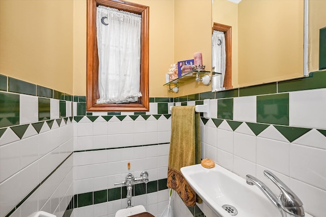 33-64 190th St, Flushing, NY 11358 - bathroom featuring tile walls, a sink, and wainscoting