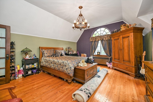 33-64 190th St, Flushing, NY 11358 - bedroom with lofted ceiling, light wood-type flooring, and a chandelier