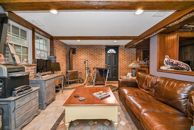 33-64 190th St, Flushing, NY 11358 - living area featuring brick wall, a wood stove, and beam ceiling