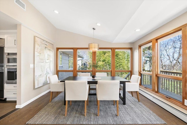 dining area with wood finished floors, recessed lighting, baseboards, a baseboard radiator, and lofted ceiling