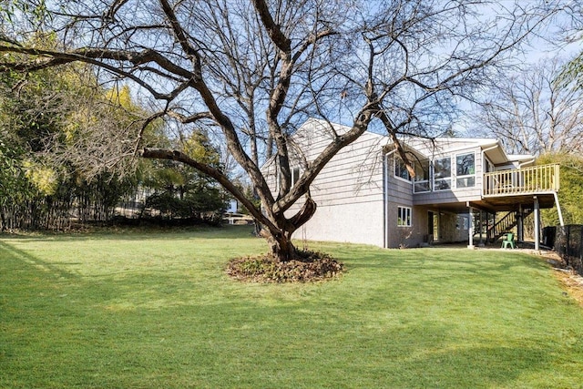 view of yard featuring stairway and a wooden deck