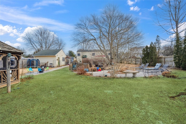 view of yard featuring a patio, a swimming pool, and fence