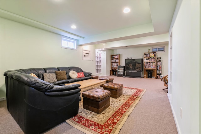 living room featuring carpet, baseboards, and recessed lighting