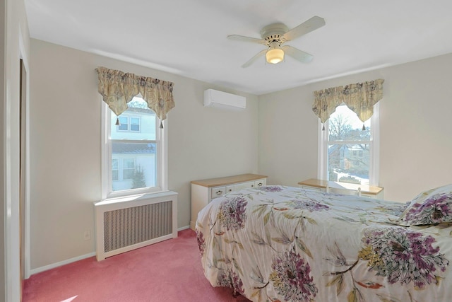 bedroom with multiple windows, radiator heating unit, a wall mounted AC, and light colored carpet