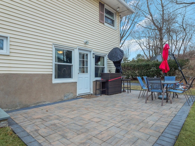 view of patio featuring outdoor dining area