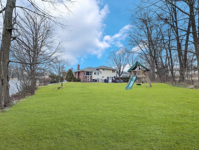 view of yard with a playground