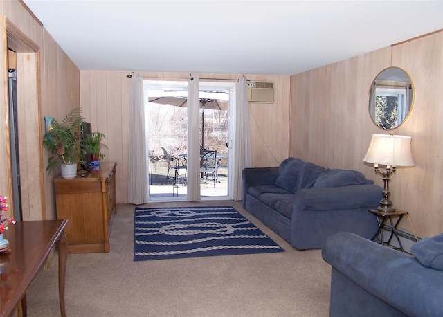 living area with carpet, a wall mounted air conditioner, and wooden walls