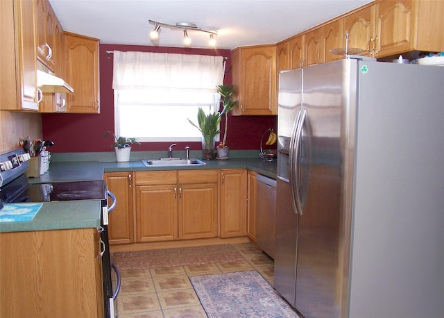 kitchen featuring range with electric cooktop, dishwasher, under cabinet range hood, stainless steel refrigerator with ice dispenser, and a sink