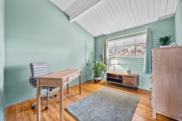 office area featuring wooden ceiling, wood walls, lofted ceiling with beams, and wood finished floors