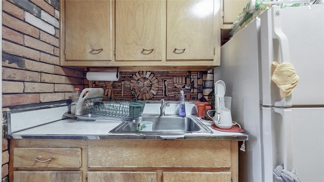 kitchen with freestanding refrigerator