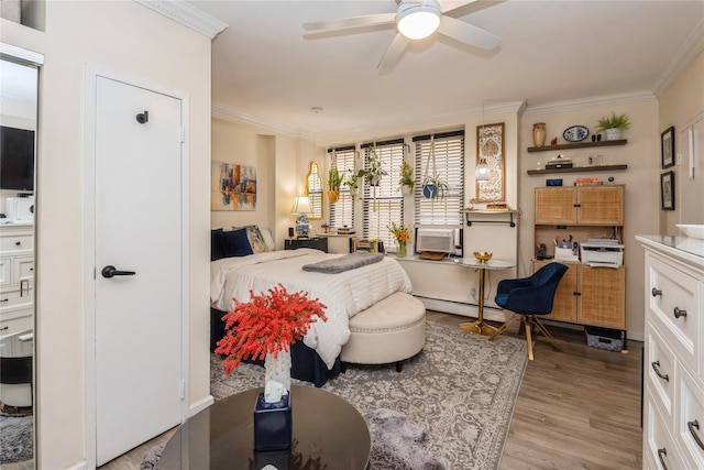 bedroom featuring light wood-style floors, ornamental molding, and baseboard heating