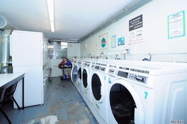 shared laundry area featuring stacked washer / drying machine and separate washer and dryer