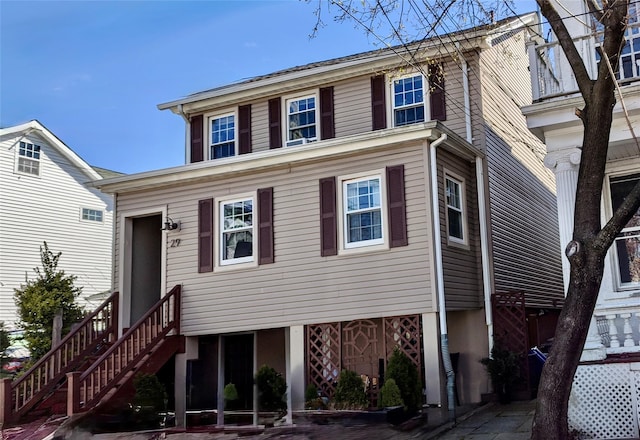 view of front of house featuring stairs