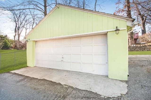 detached garage with fence