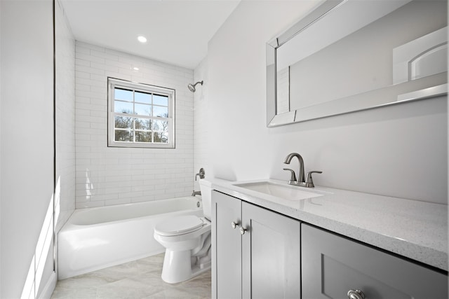 bathroom with tub / shower combination, vanity, toilet, and recessed lighting