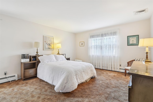 carpeted bedroom with visible vents and baseboard heating