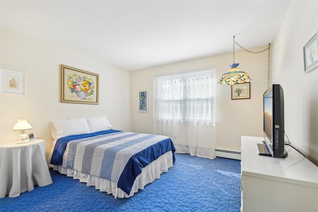 carpeted bedroom with a baseboard heating unit