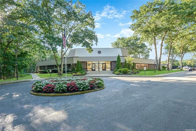 view of building exterior featuring driveway