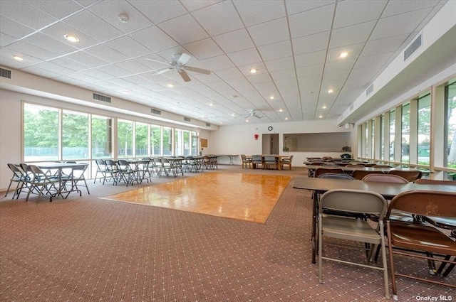 interior space featuring visible vents and carpet flooring