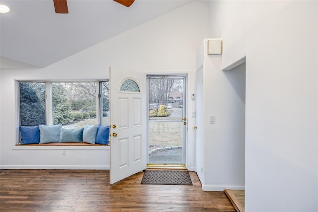 entrance foyer with high vaulted ceiling, ceiling fan, baseboards, and wood finished floors