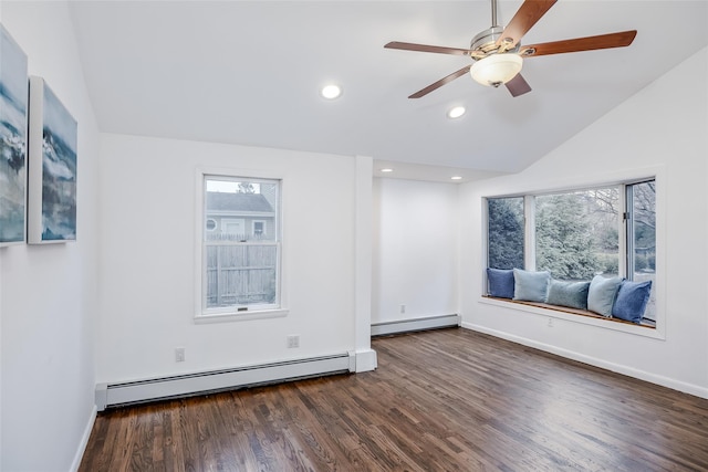 empty room featuring a baseboard radiator, vaulted ceiling, dark wood-type flooring, and recessed lighting