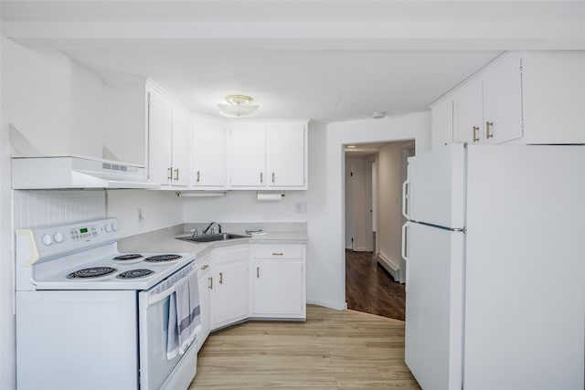 kitchen with under cabinet range hood, white appliances, a sink, white cabinetry, and light countertops