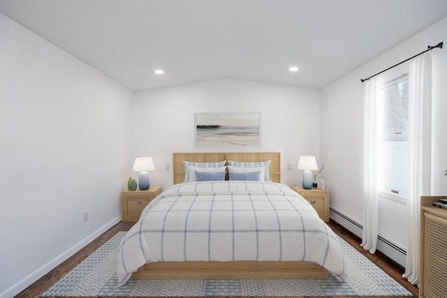 bedroom with a baseboard heating unit, recessed lighting, dark wood finished floors, and baseboards