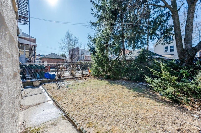 view of yard featuring fence