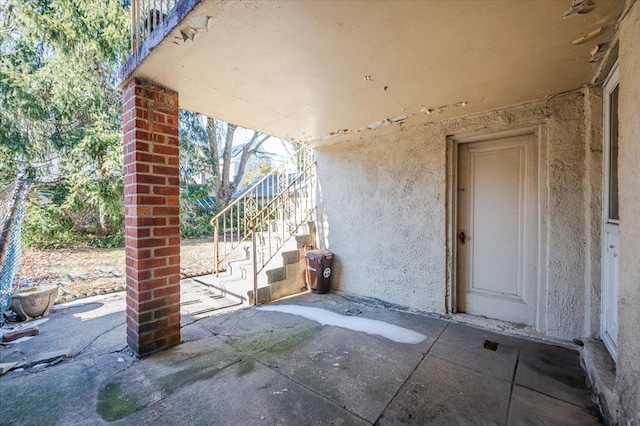 view of patio featuring stairs