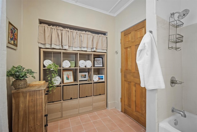 bathroom featuring ornamental molding, shower / bath combination, and tile patterned floors