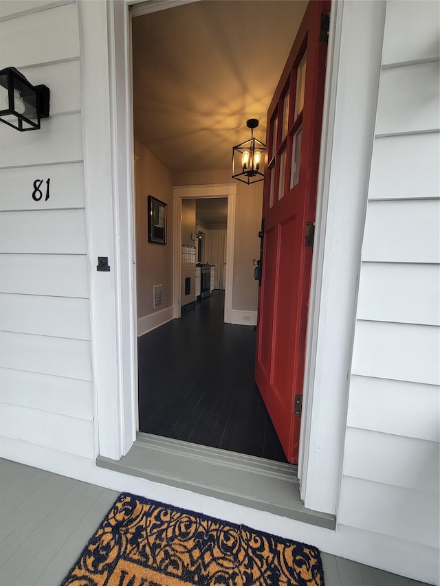 property entrance with visible vents