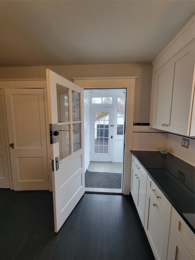 interior space featuring dark wood-style flooring