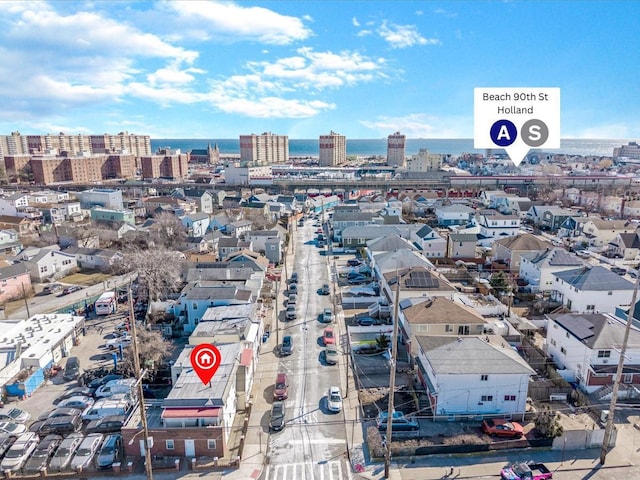 birds eye view of property with a view of city