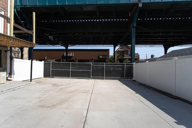 view of patio featuring fence