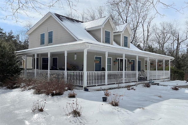 view of front of property featuring covered porch