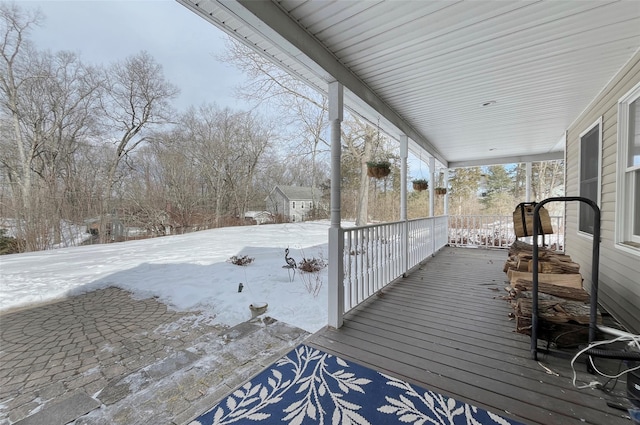 view of snow covered deck