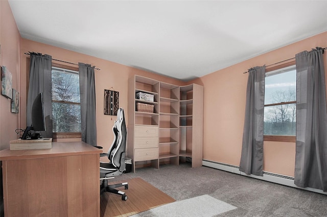 office space featuring a baseboard radiator and light colored carpet