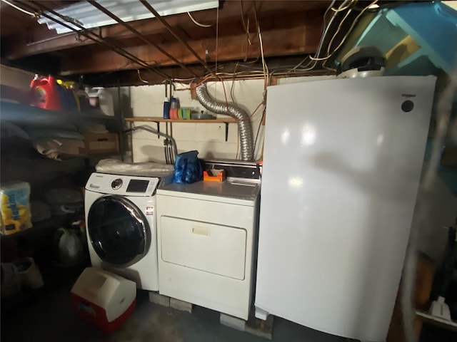 clothes washing area with laundry area and separate washer and dryer