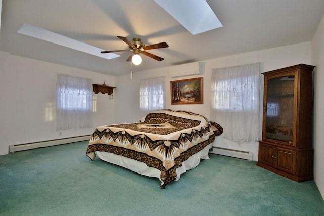 carpeted bedroom featuring a wall mounted air conditioner, a baseboard heating unit, a skylight, and a ceiling fan