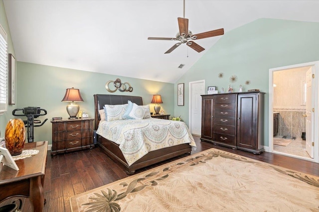 bedroom featuring dark wood finished floors, visible vents, ensuite bathroom, a ceiling fan, and baseboards