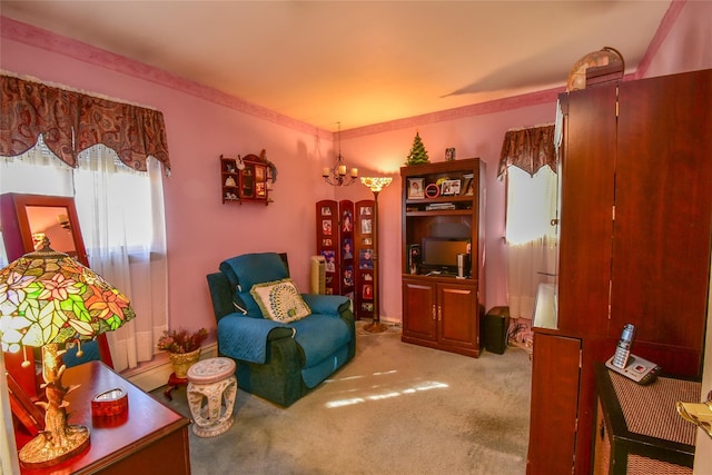 living area featuring arched walkways and light colored carpet