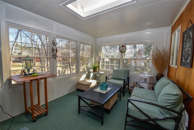 sunroom featuring lofted ceiling with skylight and a wealth of natural light