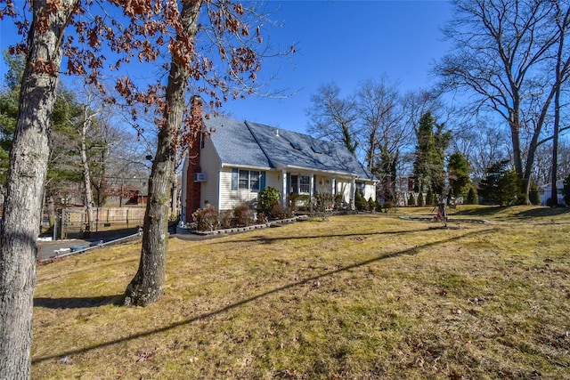 view of front of home with a front lawn