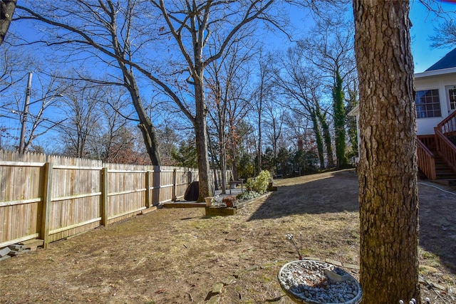 view of yard with a fenced backyard