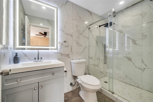 full bathroom with toilet, vanity, tile walls, a marble finish shower, and tasteful backsplash