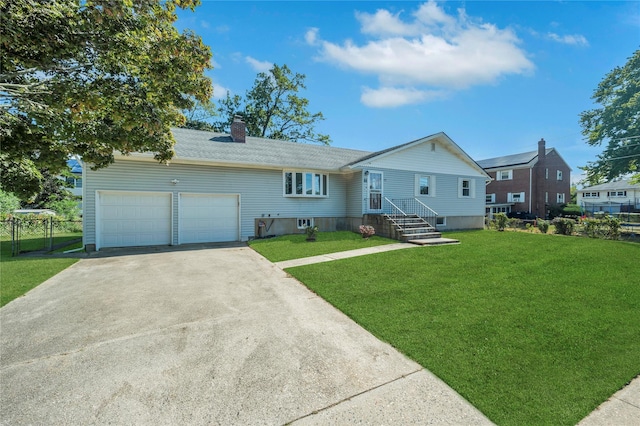 ranch-style house with an attached garage, driveway, a chimney, and a front lawn