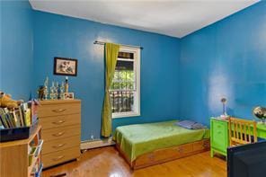 bedroom featuring light wood-type flooring